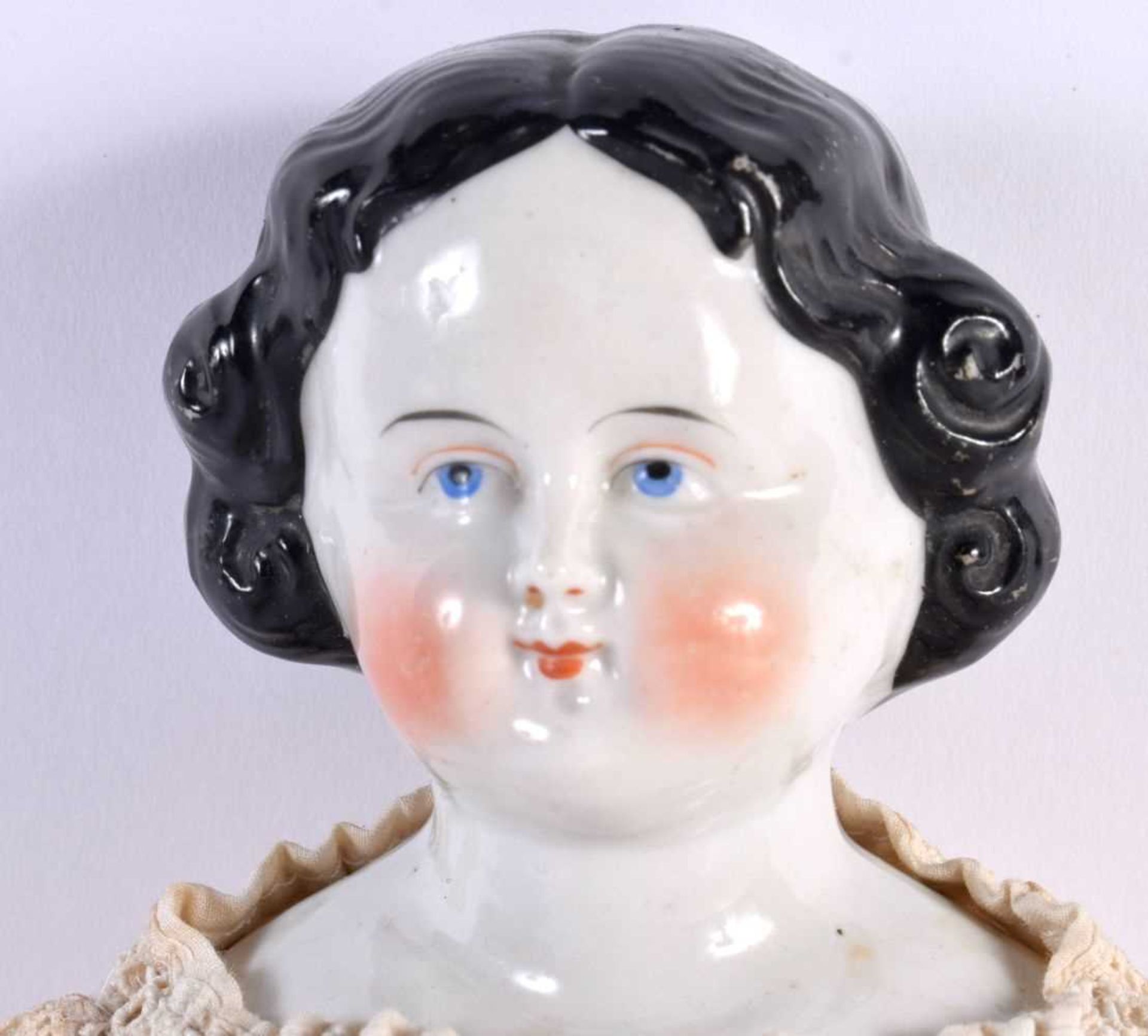 AN ANTIQUE PORCELAIN HEADED DOLL with lace outfit. 38 cm long. - Image 2 of 3