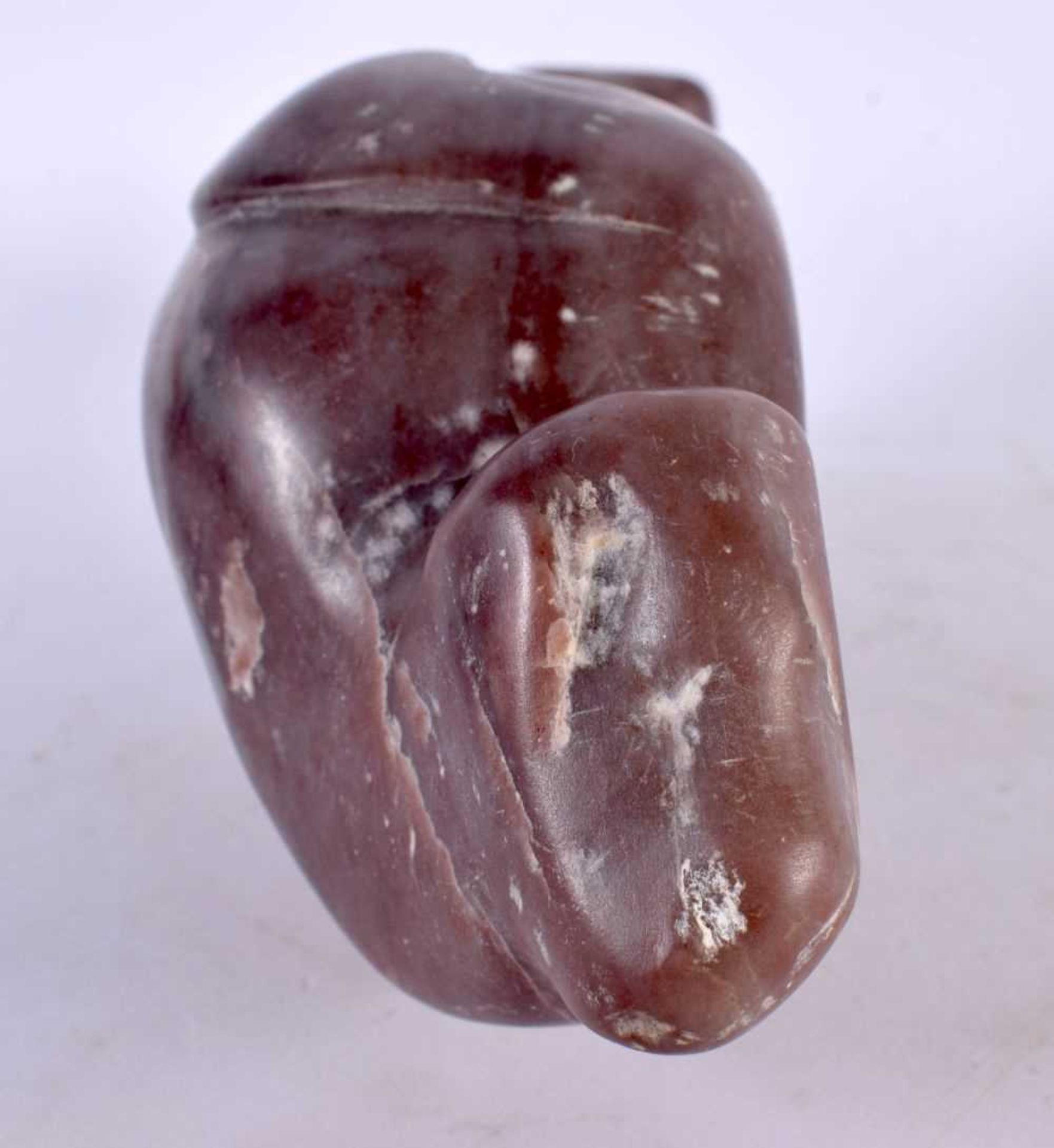 A LARGE EARLY 20TH CENTURY NORTH AMERICAN INUIT CARVED STONE SEAL of unusual form. 27 cm wide. - Image 3 of 5
