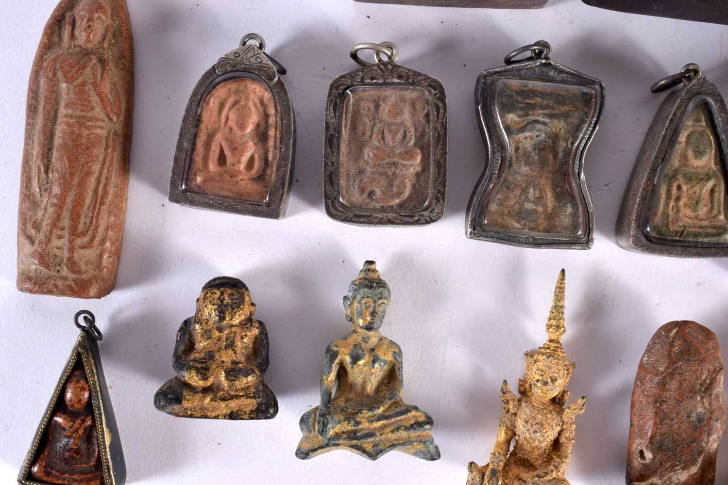 A GROUP OF 18TH/19TH CENTURY SOUTHEAST ASIAN BRONZE BUDDHA PLAQUES in various forms and sizes. - Image 3 of 8