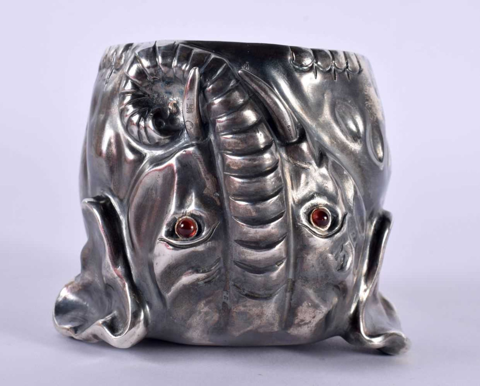 A CONTINENTAL SILVER ELEPHANT STIRRUP CUP WITH GILT INTERIOR. Stamped 88, 9cm x 7cm, weight 279g