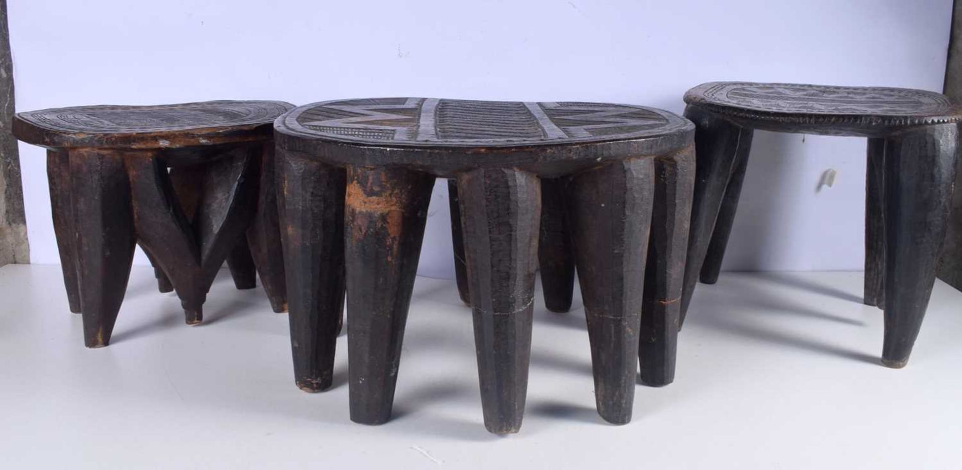 Three early African Nupe Culture carved wood Tribal stools largest 26 x 42 cm (3).
