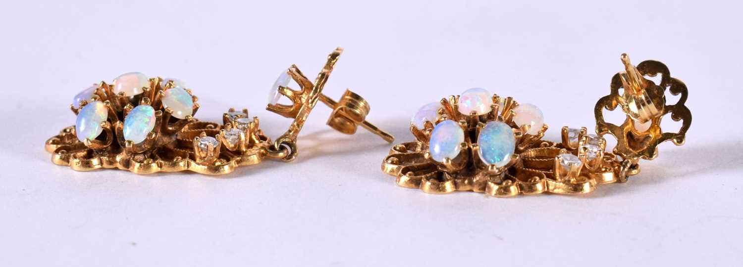 A PAIR OF 14CT GOLD DIAMOND AND OPAL DROP EARRINGS. Stamped 14K, 5.3cm x 3.1cm, weight 10.5g - Image 3 of 3