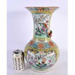 A LARGE 19TH CENTURY CHINESE CANTON FAMILLE ROSE PORCELAIN VASE Qing, painted with birds on a yellow