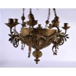 A LATE 19TH CENTURY ARTS AND CRAFTS BRONZE HANGING CHANDELIER bearing inscription to rim Lucernum