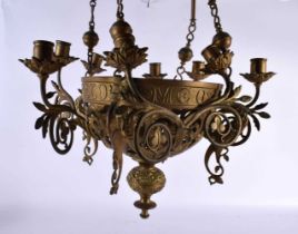 A LATE 19TH CENTURY ARTS AND CRAFTS BRONZE HANGING CHANDELIER bearing inscription to rim Lucernum
