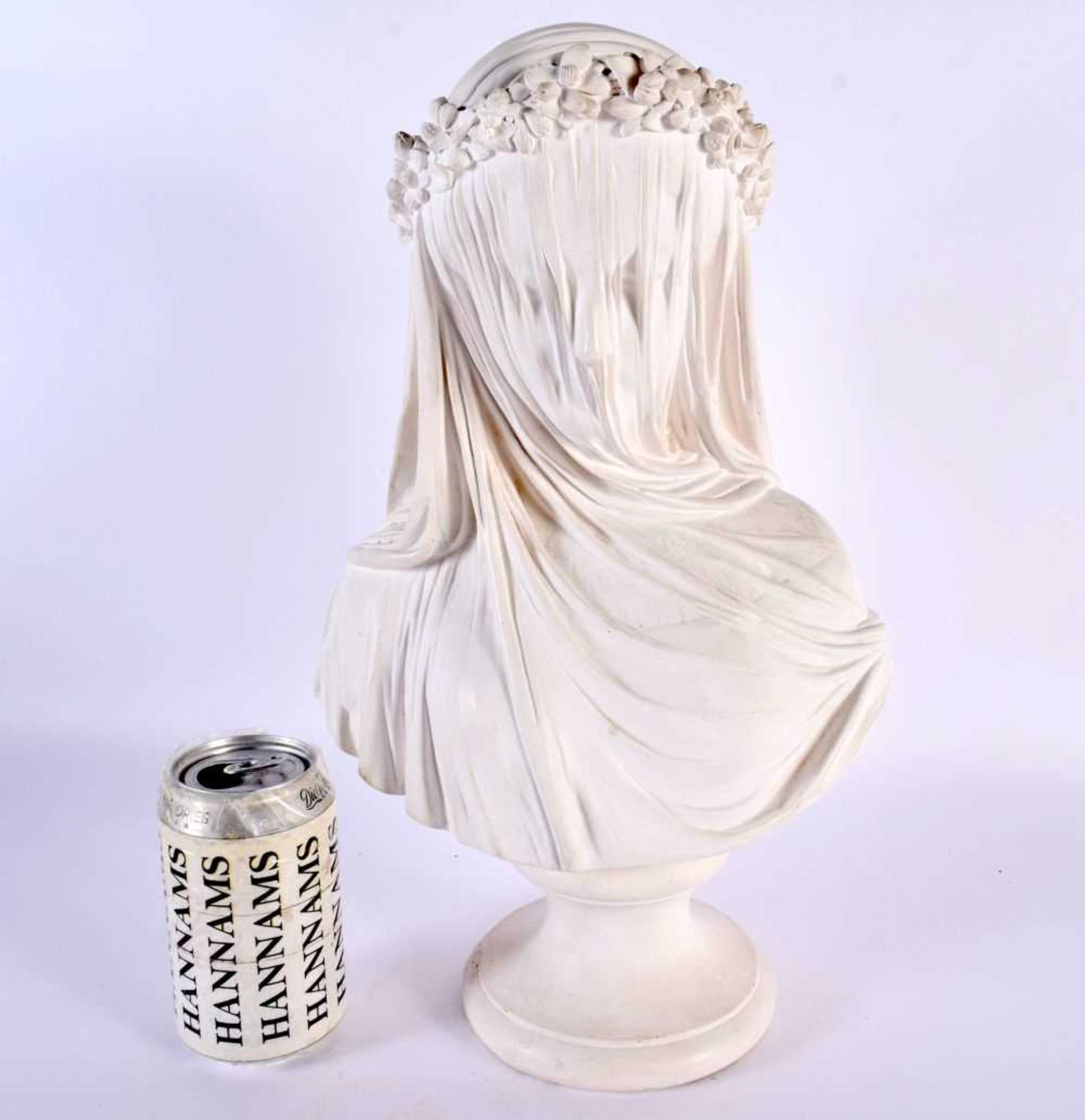 A LARGE EARLY 20TH CENTURY EUROPEAN PLASTER FIGURE OF A VEILED FEMALE modelled upon a pedestal. 38