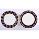 AN ANTIQUE SPODE JEWELLED PLATE together with a similar Minton plate. 25 cm diameter. (2)