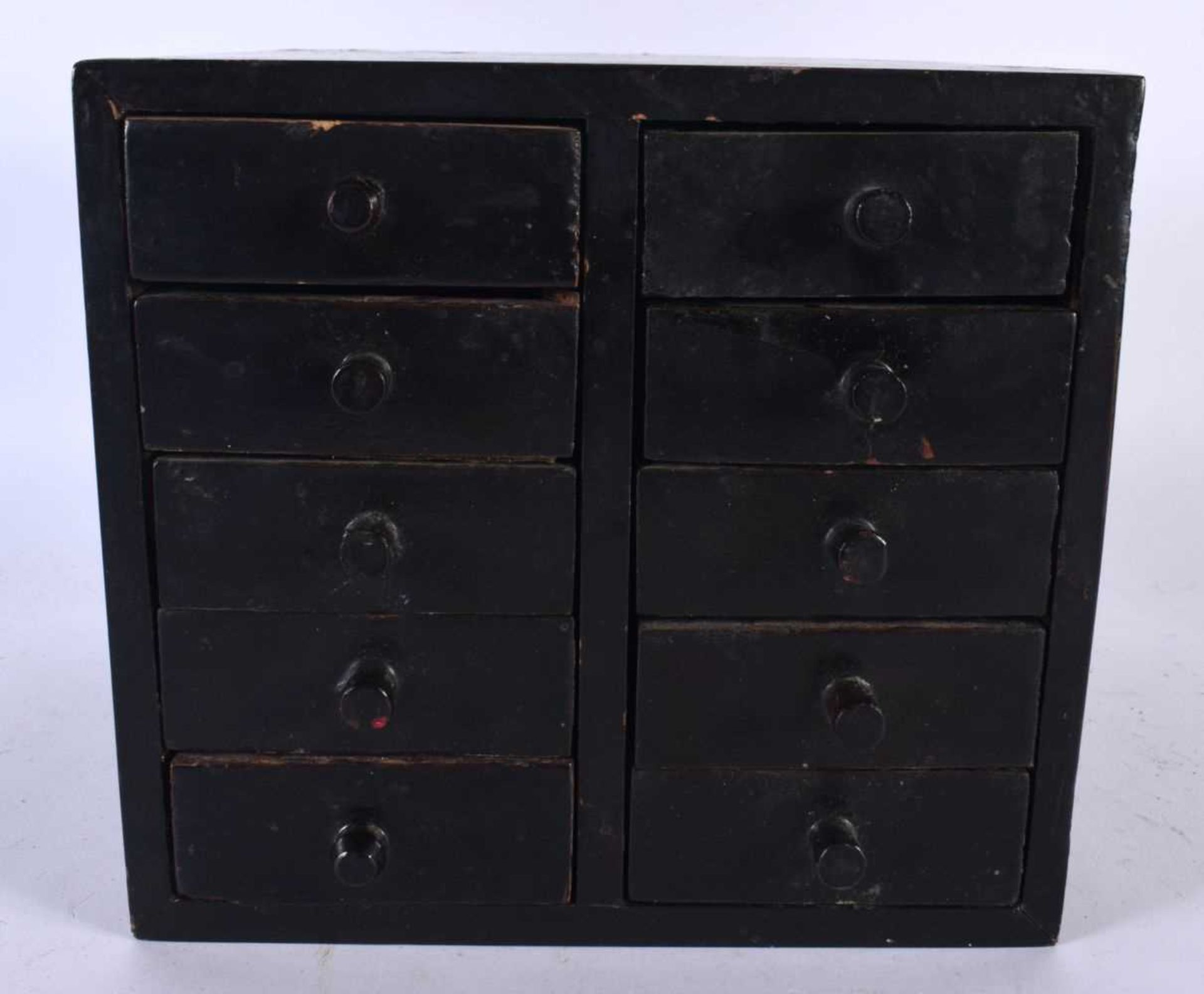 A SMALL ANTIQUE LACQUERED CHEST OF DRAWERS. 18cm x 18cm.