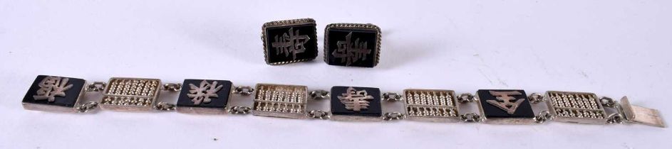 A CHINESE SILVER BRACELET WITH MATCHING EARRINGS. Stamped Sterling., Bracelet 18cm long, total