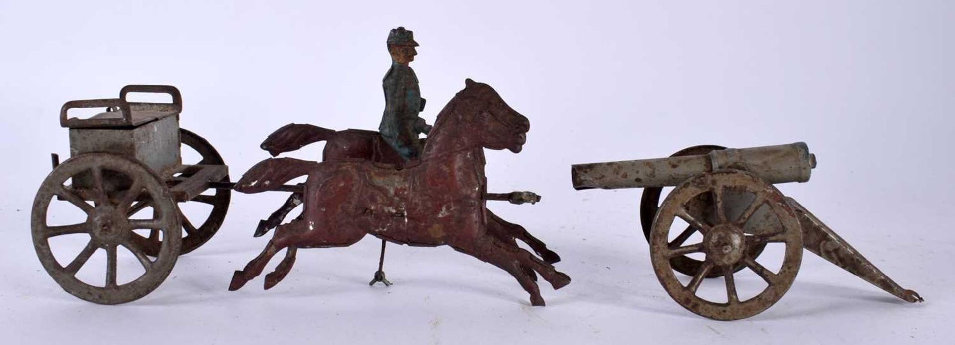 TWO EARLY TINPLATE TOYS. Largest 14cm wide. (2)