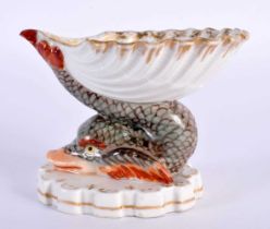 AN 18TH/19TH CENTURY GERMAN PORCELAIN DOLPHIN SHELL SALT Berlin or Meissen, painted with fowl within