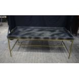 A Levi Tray brass and wooden tray top table covered in Faux velum 47 x 117 x 56 cm.