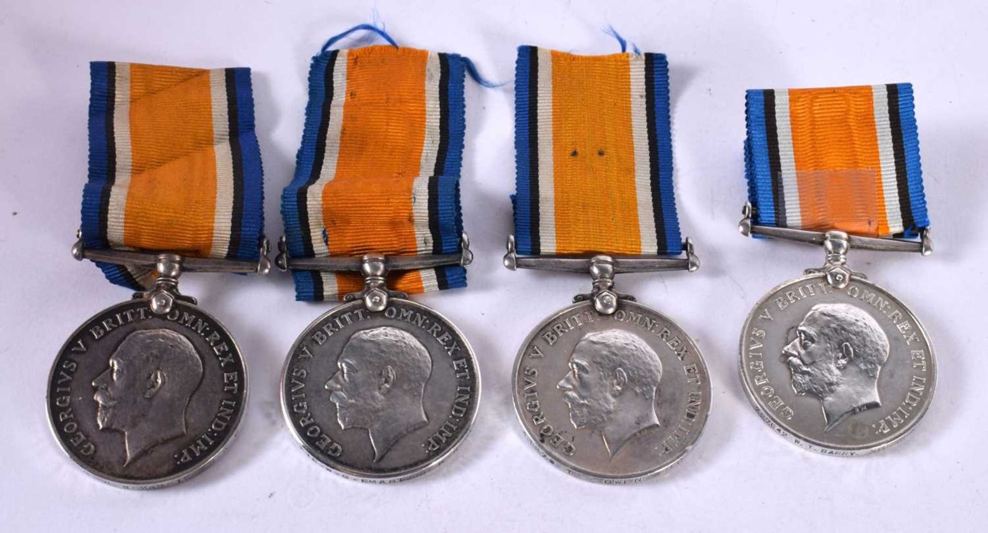 FOUR GEORGE V WAR MEDALS.  Awarded to – K41278 T Owen Sto1 RN, 207642 WT Barry Sig RN. 230659 3AM HS