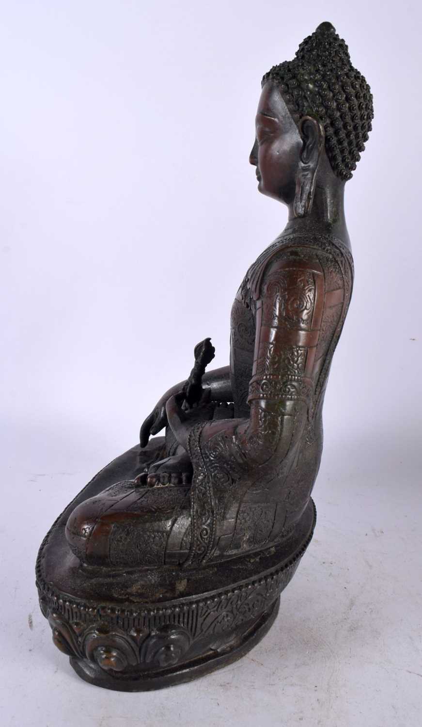 A LARGE CHINESE TIBETAN BRONZE FIGURE OF A BUDDHA 20th Century. 30cm x 16 cm. - Image 5 of 8