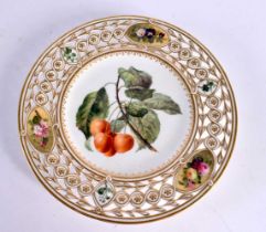 A FINE 19TH CENTURY ENGLISH PORCELAIN RETICULATED CABINET PLATE Attributed to Minton, painted with