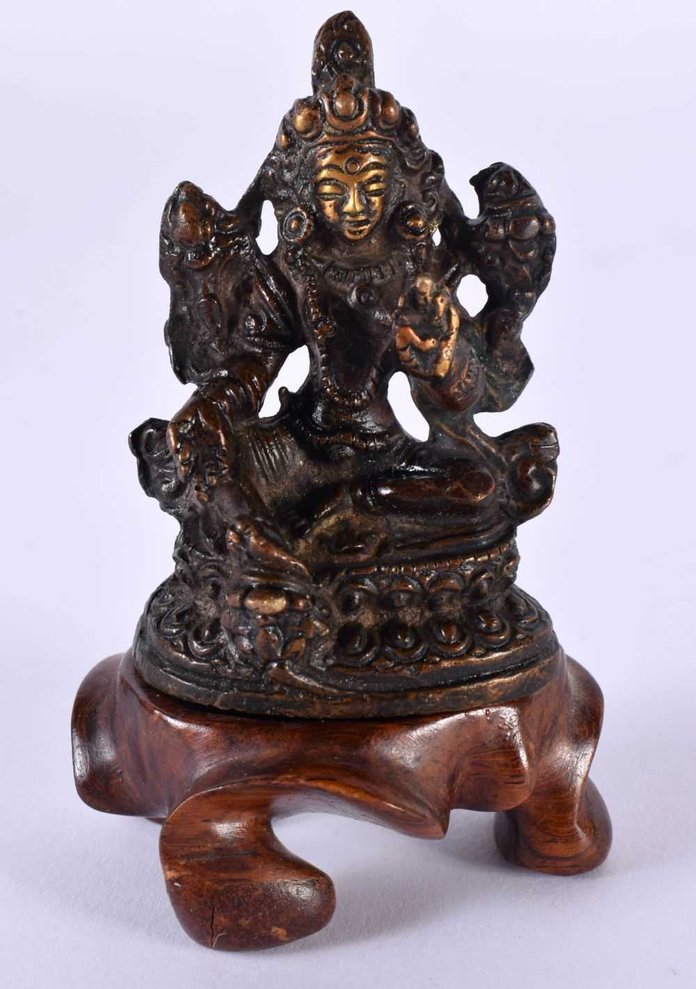 A CHINESE TIBETAN BRONZE BUDDHA 20th Century. 89.9 grams. 5.75 cm x 4 cm.