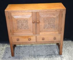 A Solid oak Arts and Craft style 2 drawer sideboard 86 x 90 x 32 cm.