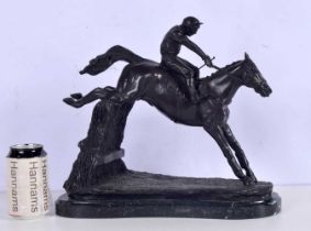 A large bronze Horse and Jockey jumping a fence mounted on a marble plinth 3 x 35 cm.