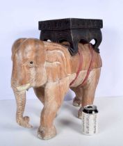 A carved hardwood elephant plant stand. 47 X 47cm .