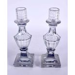 A PAIR OF ANTIQUE GLASS CANDLESTICKS possibly George III. 23.5 cm high.