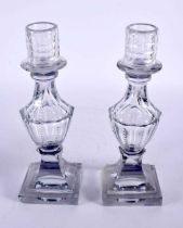 A PAIR OF ANTIQUE GLASS CANDLESTICKS possibly George III. 23.5 cm high.