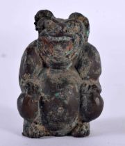 AN EARLY CHINESE BRONZE FIGURE OF A SEATED BEAST. 124.5 grams. 6 cm x 4 cm.
