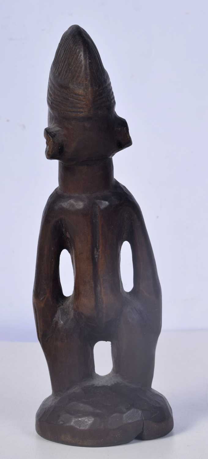 A carved wood Nigerian Yoruba female Ibeji figure 24 cm. - Image 3 of 5