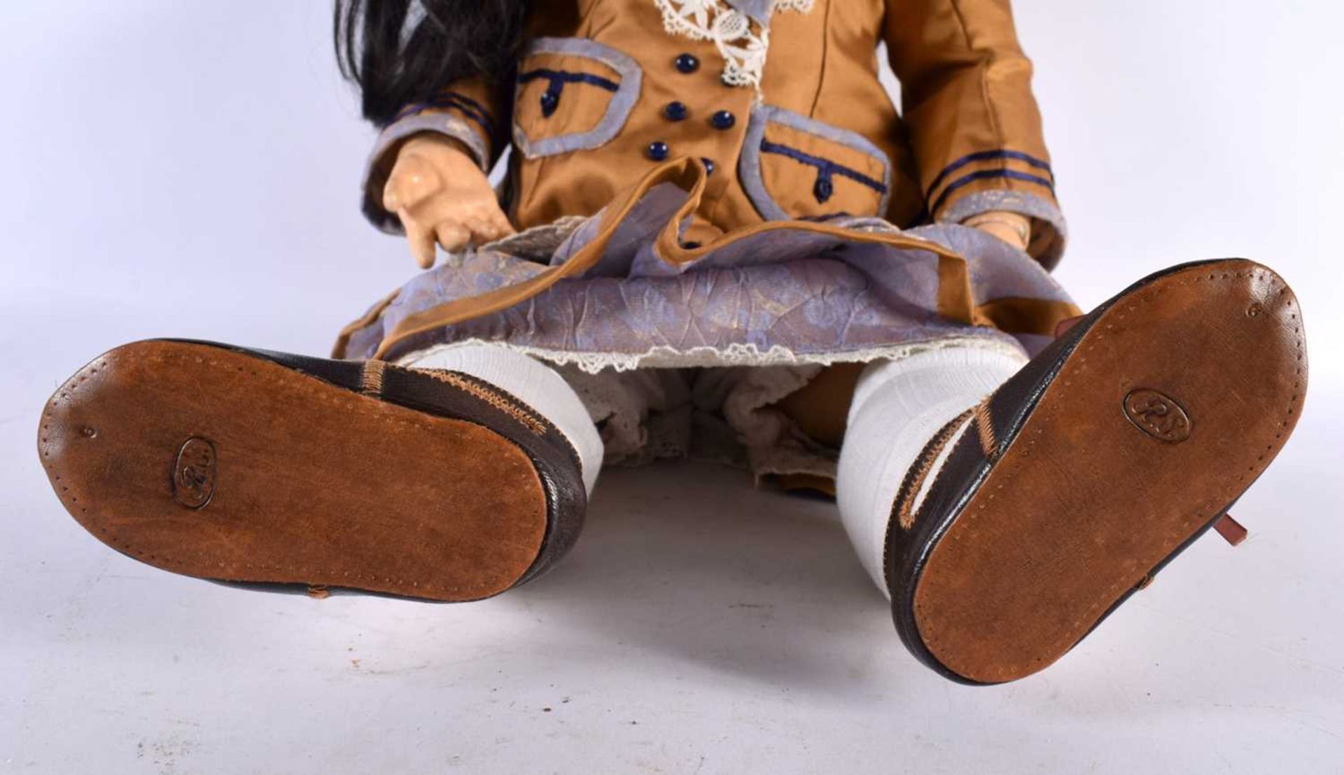 A FINE SIMON HALBIG BISQUE HEADED PORCELAIN DOLL wearing original mustard clothing. 65 cm long. - Image 5 of 6