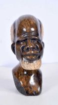 A Shona stone head sculpture from Swaziland, South Africa. 18 X 12 cm .