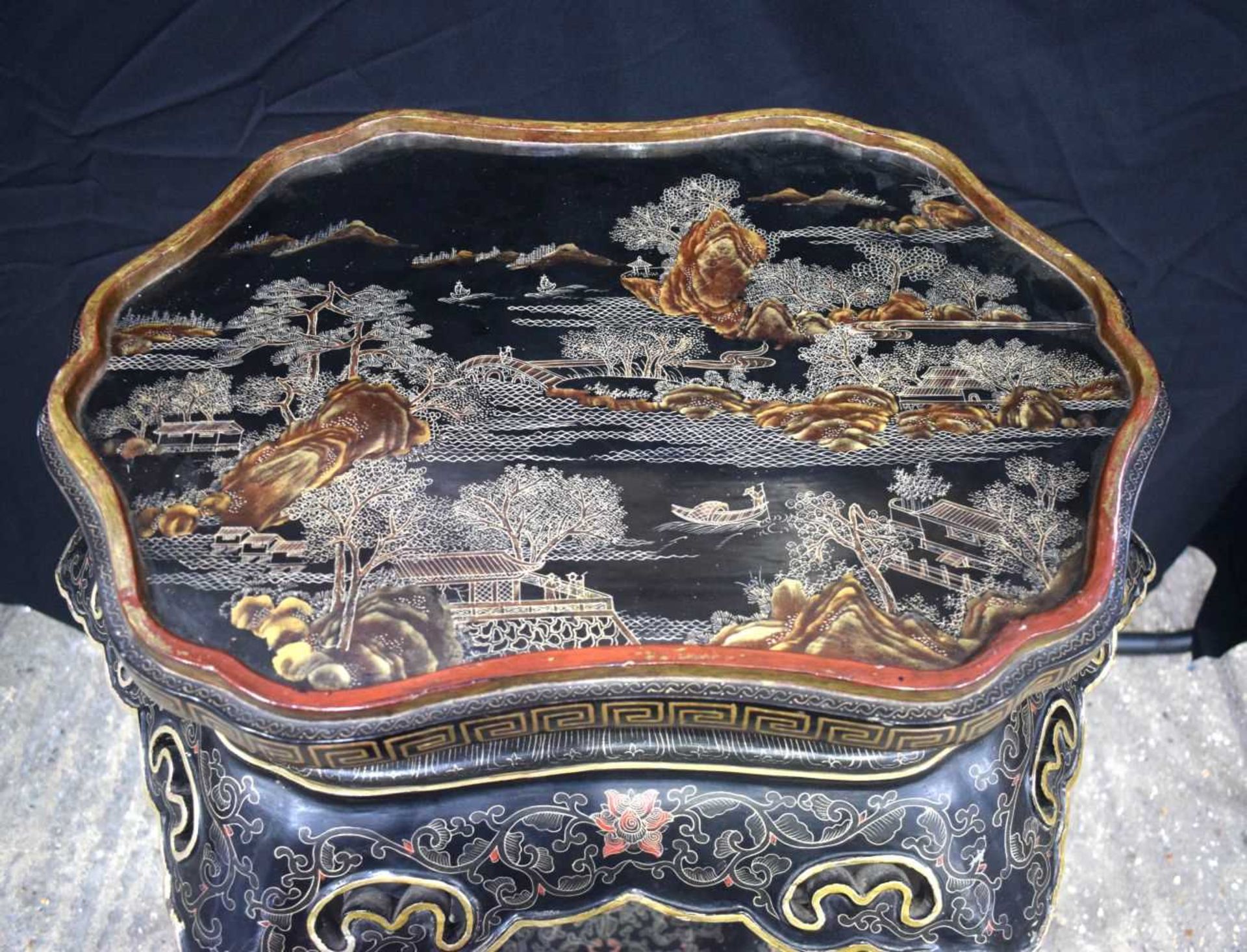 A 19th Century Chinese laquered table decorated with gilt decoration of a lakeside scene 93 x 77 x - Image 2 of 6