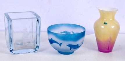 A Caithness glass vase together with a heavy engraved glass bowl and a glass Dolphin bowl largest