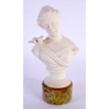 AN EARLY 20TH CENTURY PARIAN WARE BUST OF A FEMALE modelled with a bird on her shoulder. 15cm high.