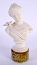 AN EARLY 20TH CENTURY PARIAN WARE BUST OF A FEMALE modelled with a bird on her shoulder. 15cm high.