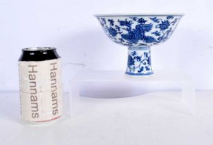 A Chinese blue and white porcelain stem cup, decorated with foliage. 15.5 cm wide.