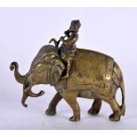 A 19TH CENTURY INDIAN BRONZE FIGURE OF A ROAMING ELEPHANT modelled with monkey attendant. 11cm x