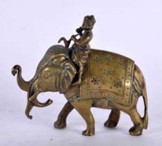 A 19TH CENTURY INDIAN BRONZE FIGURE OF A ROAMING ELEPHANT modelled with monkey attendant. 11cm x