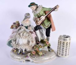 A LARGE ANTIQUE GERMAN PORCELAIN FIGURAL GROUP. 30cm x 22cm.