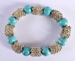 A SILVER AND TURQUOISE BRACELET. 53.4 grams. 10 cm wide.