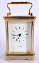 A GARRARD CARRIAGE CLOCK. 15 cm high inc handle.