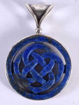 AN EARLY 20TH CENTURY SILVER AND LAPIS LAZULI PENDANT of Celtic design. 8 grams. 4 cm x 2.5 cm.