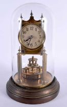 A BRASS ANNIVERSARY CLOCK with glass dome. 28 cm x 14 cm. Note: A torsion pendulum clock, more