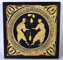 AN 18TH/19TH CENTURY MIDDLE EASTERN ISLAMIC POTTERY TILE painted with two opposing males , flanked