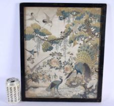 A 19TH CENTURY CHINESE SILK EMBROIDERED PANEL Qing, depicting assorted birds of paradise amongst