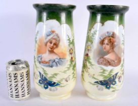 A LARGE PAIR OF EARLY 20TH CENTURY CONTINENTAL GLASS VASES decorated with portraits of females,