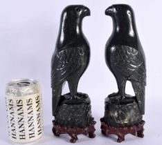 A PAIR OF 19TH CENTURY CHINESE CARVED GREEN JADE FIGURES OF PARROTS Qing, each boldly modelled