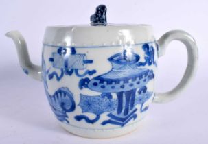 A GOOD 17TH CENTURY CHINESE BLUE AND WHITE PORCELAIN TEAPOT AND COVER Kangxi, of barrel form,