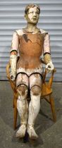 A FINE AND RARE LARGE LIFE SIZED 19TH CENTURY PAINTED WOOD ARTISTS LAY DOLL with glass eyes,