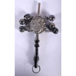 A Silver Babies Rattle with an ebonised handle. Stamped Sterling Silver, 17.5cm x 6.4cm x 1.6cm,