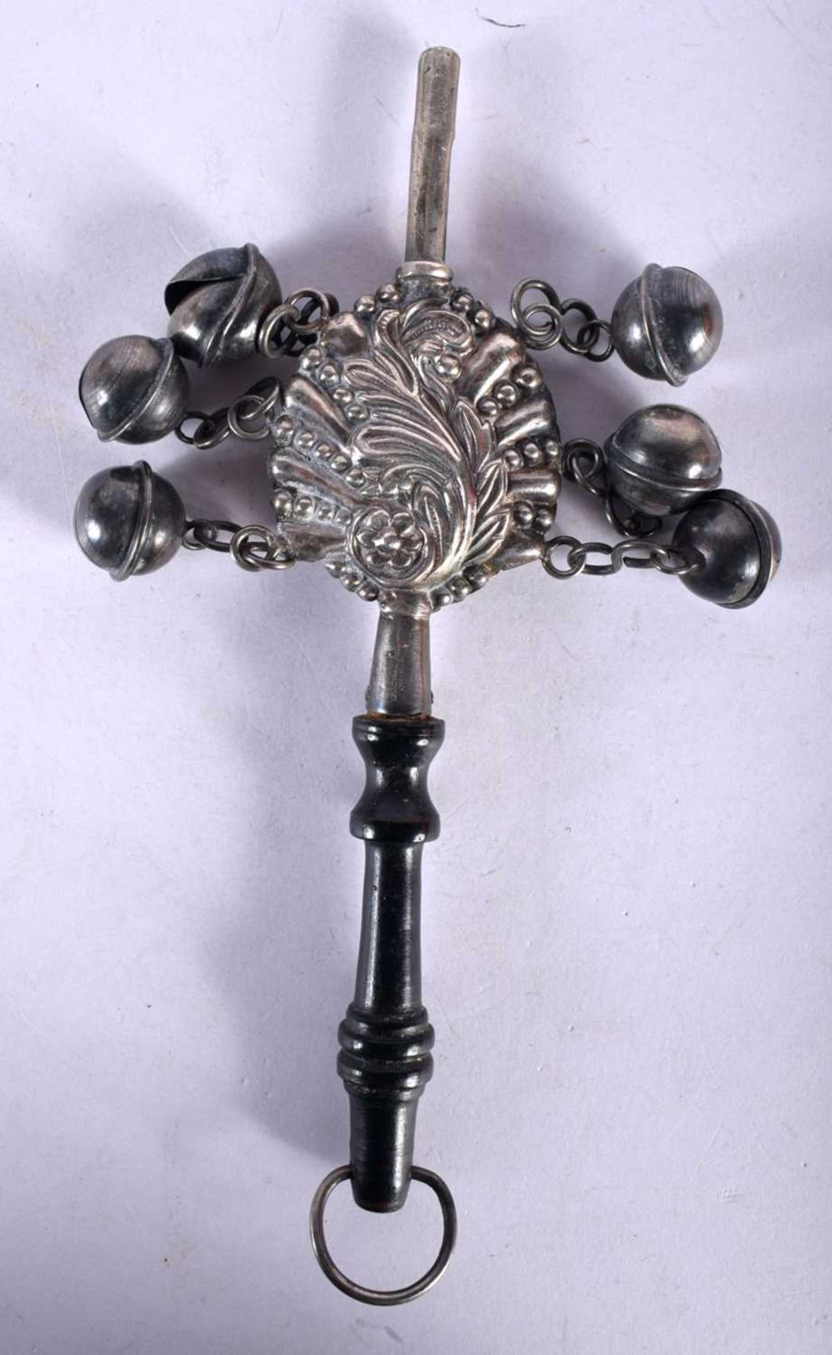 A Silver Babies Rattle with an ebonised handle. Stamped Sterling Silver, 17.5cm x 6.4cm x 1.6cm,