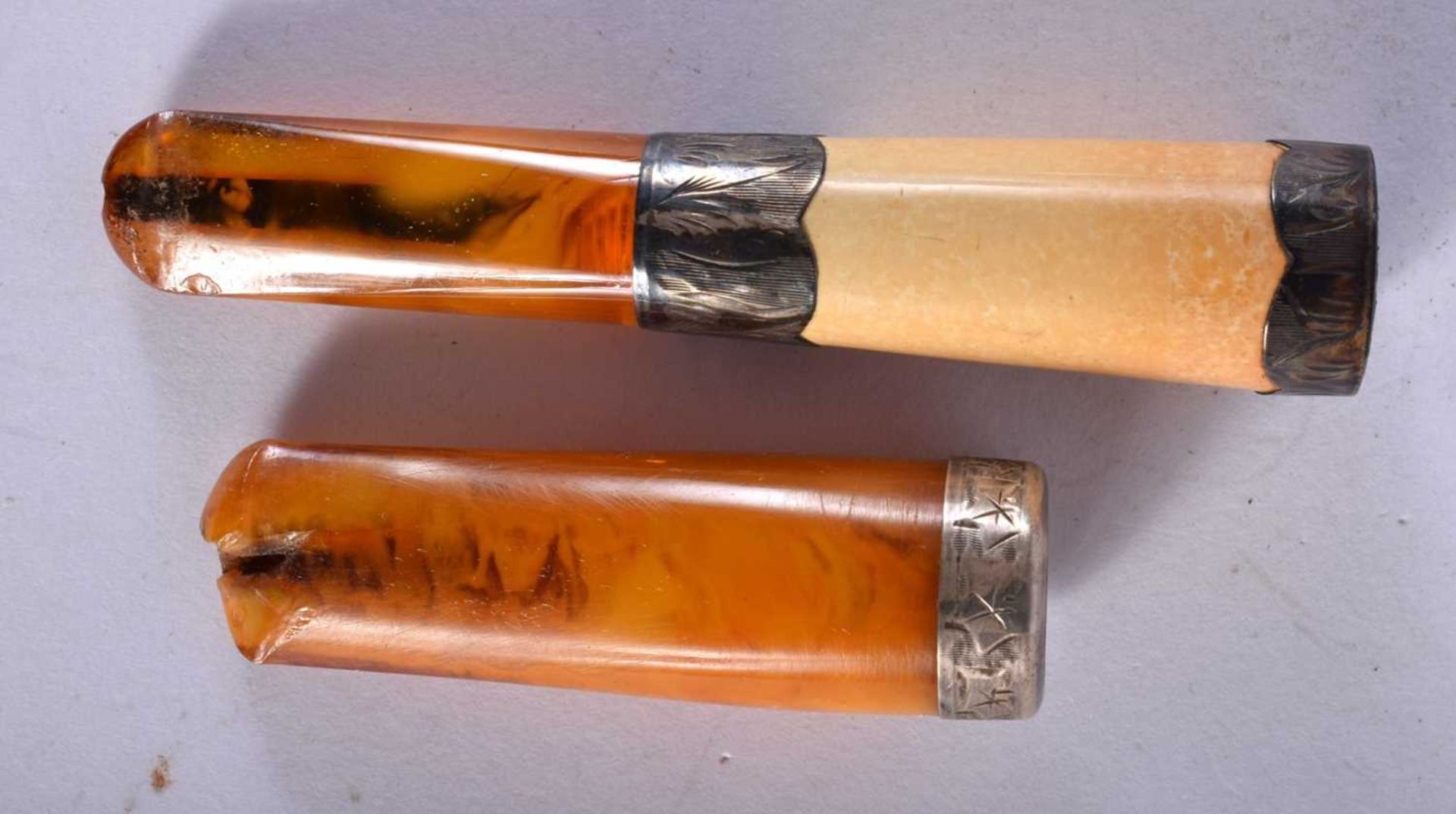 Five Cased Cheroot Holders with Amber Tips and Silver Mounts together with a Silver Cigar Punch (6). - Image 3 of 4